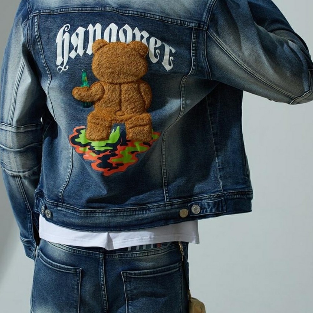 Mens Fifth Loop small jacket with fur bear emblem on back.